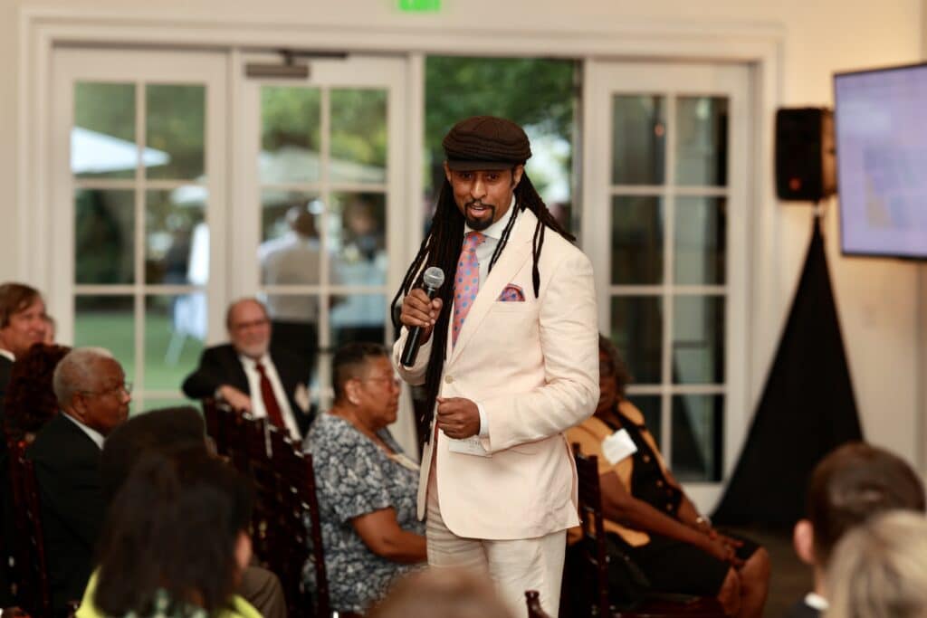 Dr. Mustafa Santiago Ali addresses attendees
