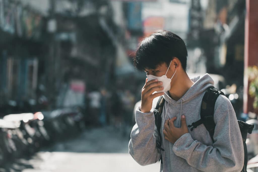 Man wearing N95 Respiratory Protection Mask in city
